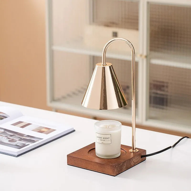 Wax melting lamp with oak wood base and white iron lampshade on a bedside table