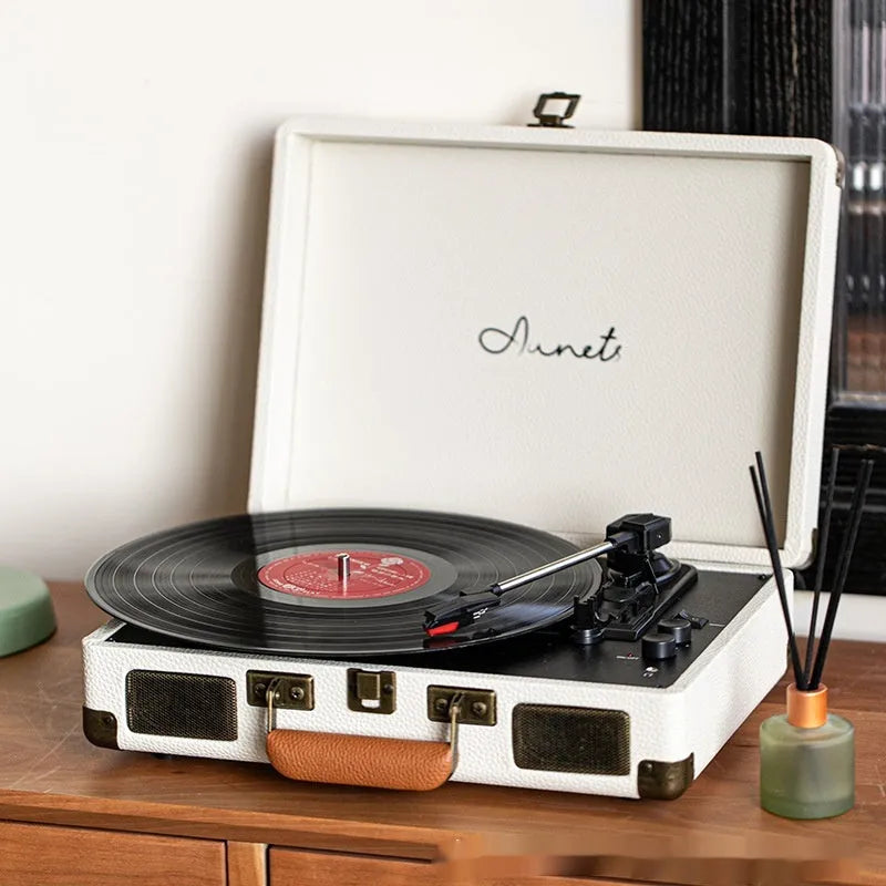 Retro phonograph Bluetooth record player in leather suitcase case with turntable and controls