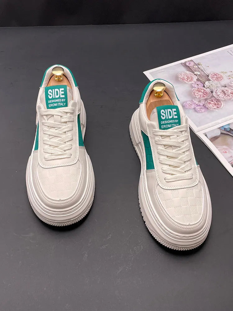 Unisex white sports casual shoes with cloth upper and rubber foam sole in black or green accent colours