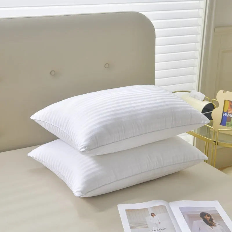 White hotel cotton satin stripe pillow with feather cotton filling shown in three size options.