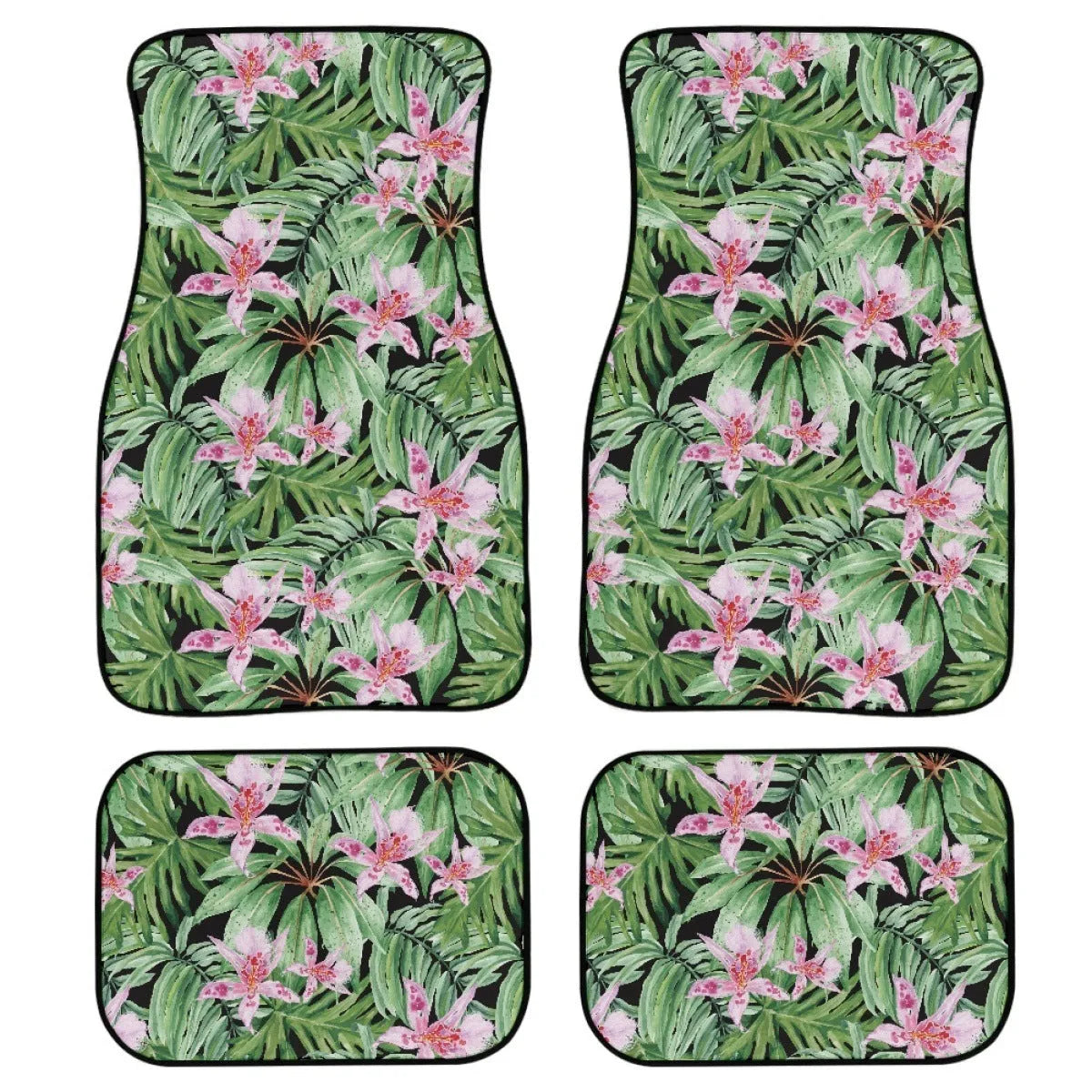 Set of four black printed rubber car floor mats with textured surface, showing thickness.