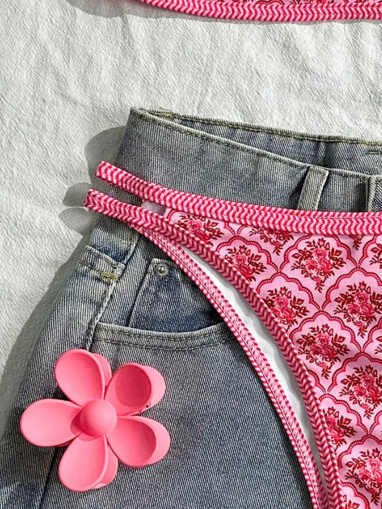Pink printed two-piece bikini set with shoulder straps and exposed back cut-out for ladies