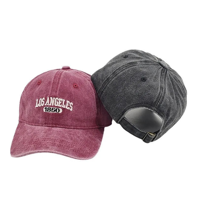 Retro personalised embroidered letters peaked cap in distressed fabric, adjustable fit, shown in beige colour.