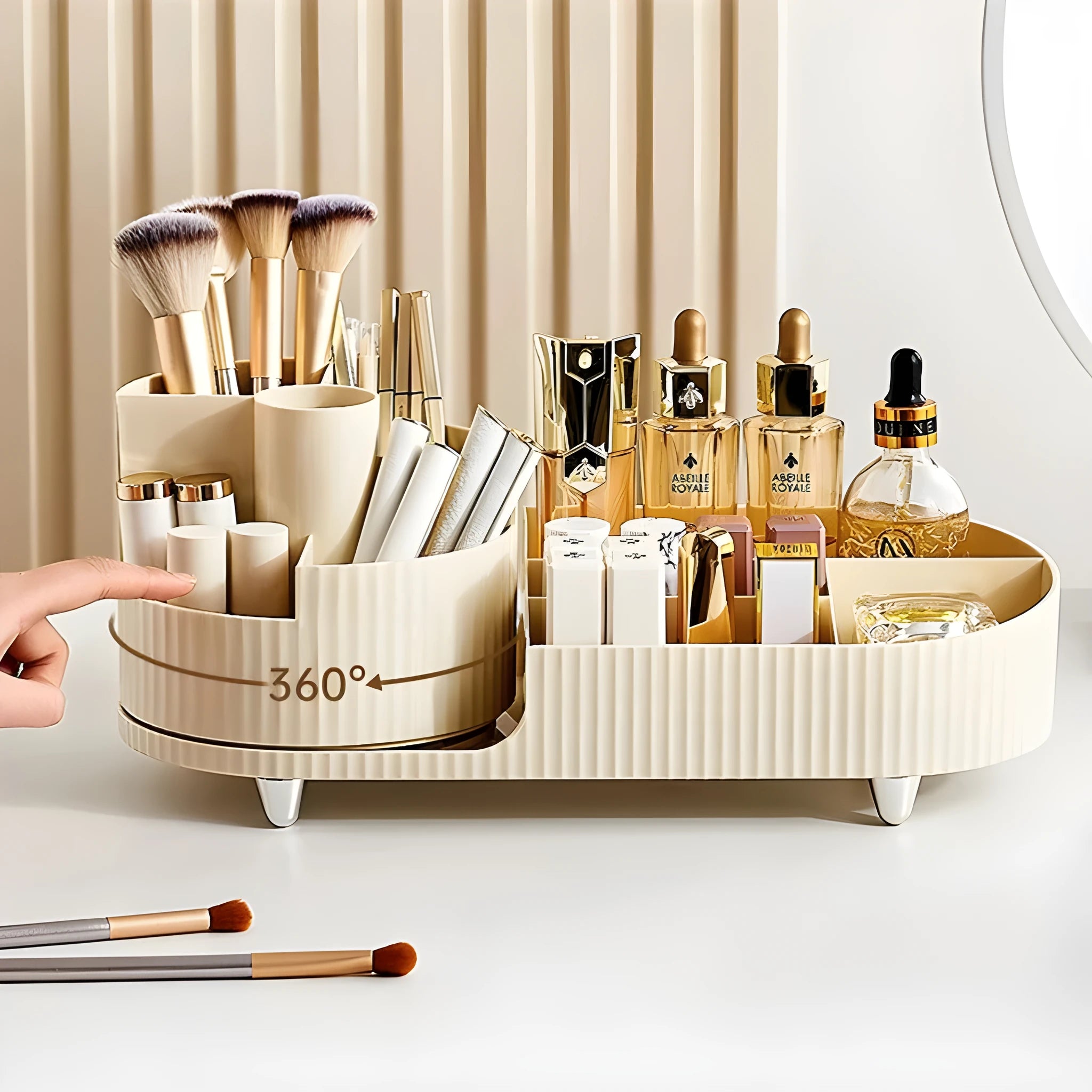 Rotating cosmetics storage box with makeup brushes and lipsticks organised on dressing table