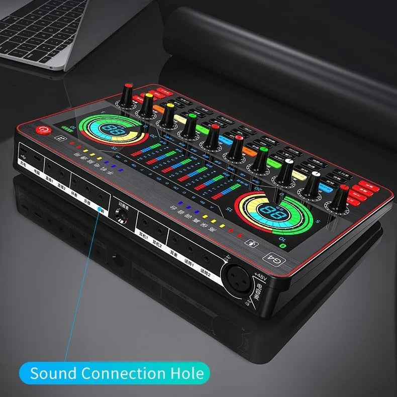 G4 professional live sound card mixer with colourful LCD screen and microphone on a desk.