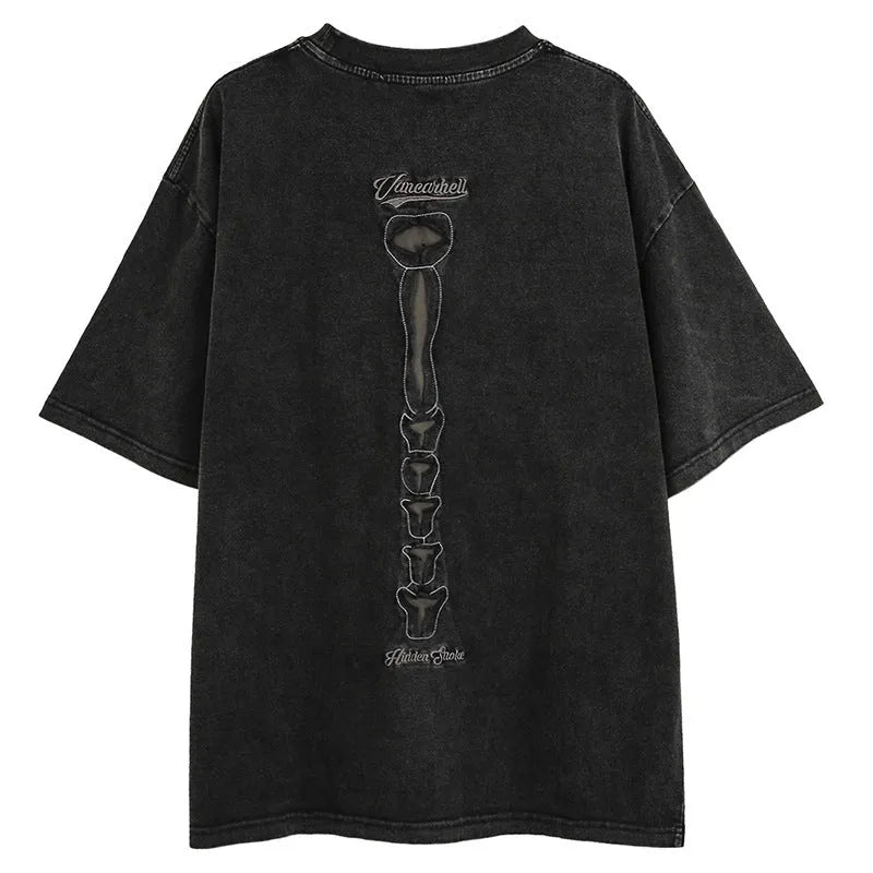 Black loose-fit cotton t-shirt with a printed skull and letter design on the front.