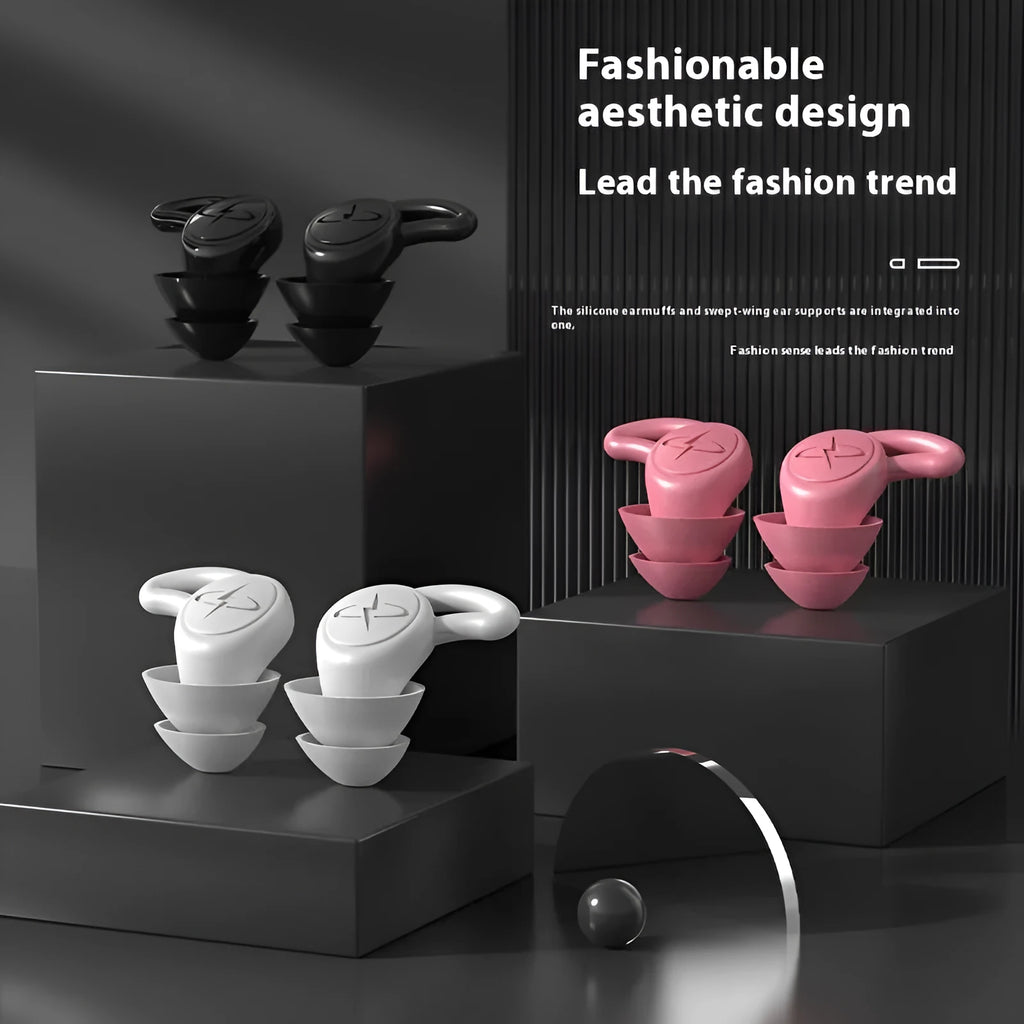 Pair of silicone noise reduction earplugs in black for sleep and sound insulation