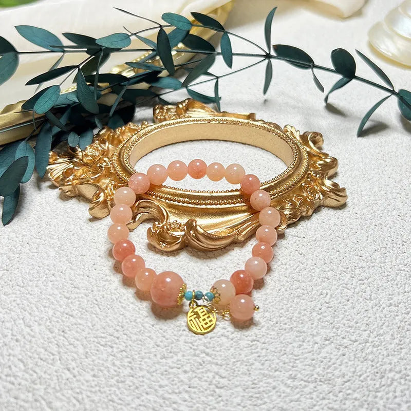 Pink natural stone bracelet with adjustable alloy chain for women