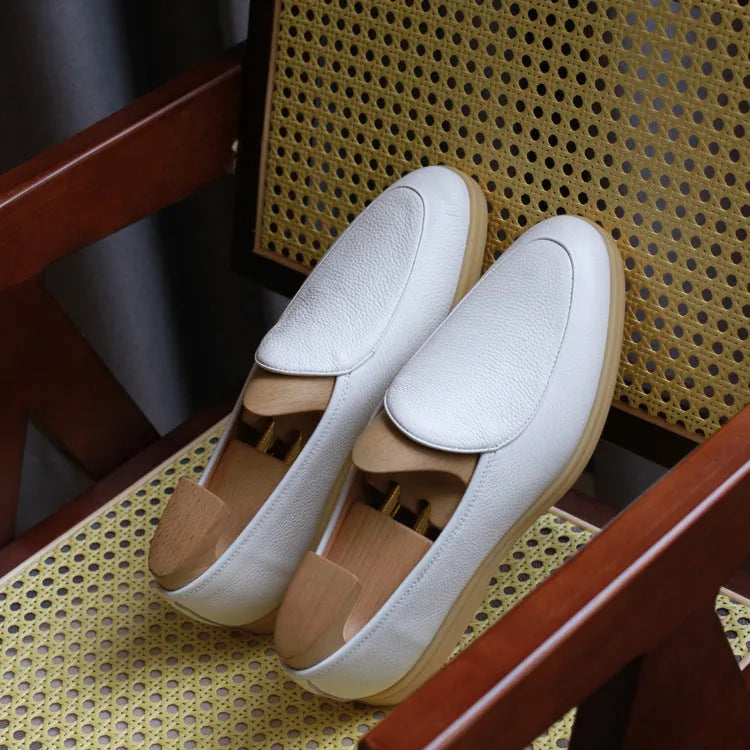 Men's genuine leather loafers in beige, shown in a low-top design with a TPR sole.