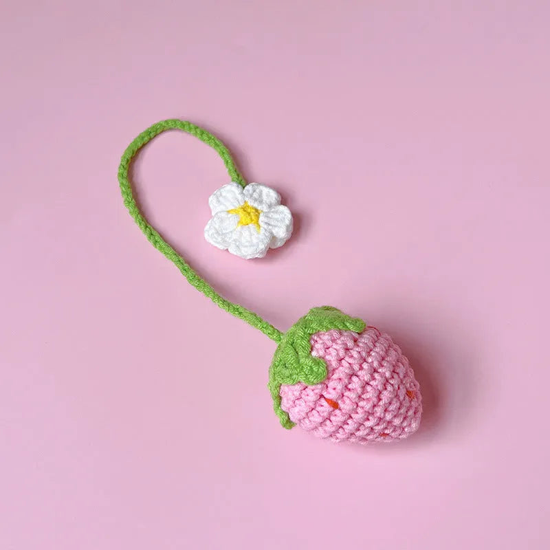 Wool crochet strawberry pendant necklace with woven design measuring 35cm in pink or red colour