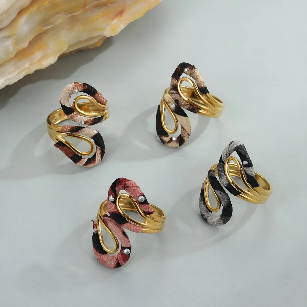 Stainless steel open mouth ring with leopard print design in geometric heart star shapes