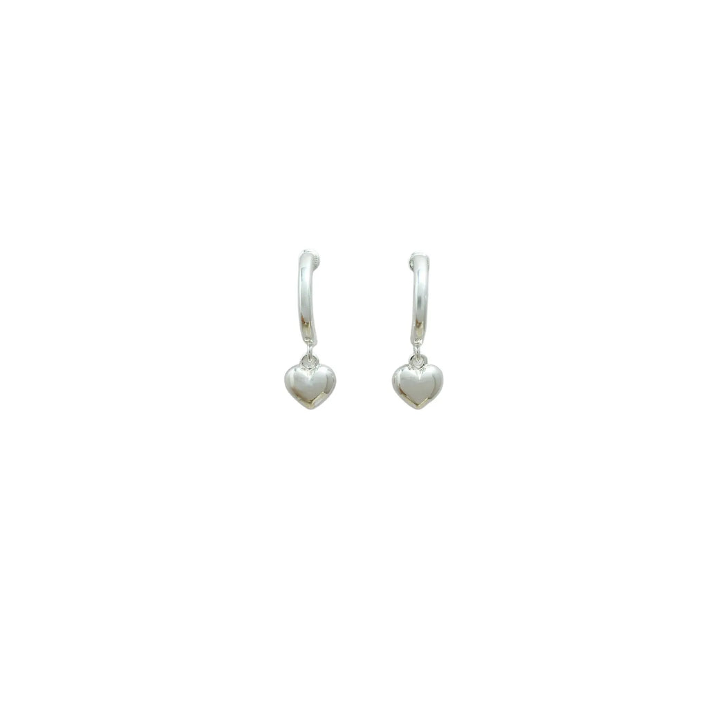 Pair of copper heart-shaped C-style earrings in gold electroplated finish on white background