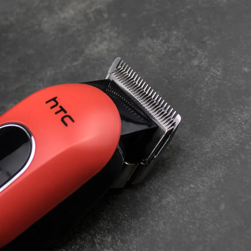 Professional digital electric hair clipper with limiting combs, available in black, red, and white colours.