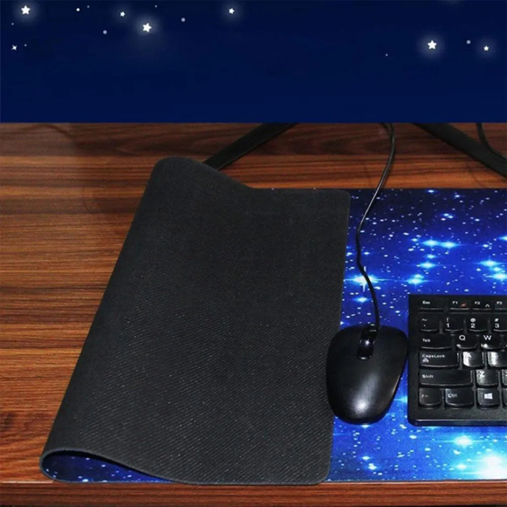 Blue star mouse pad with high-density fabric surface and natural rubber anti-skid base on a desk