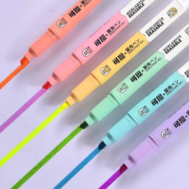 Set of six double-headed fluorescent graffiti marker pens with plastic shells in assorted colours