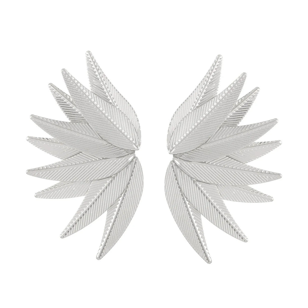 Gold and white leaf-shaped alloy patch earrings with botanical design details