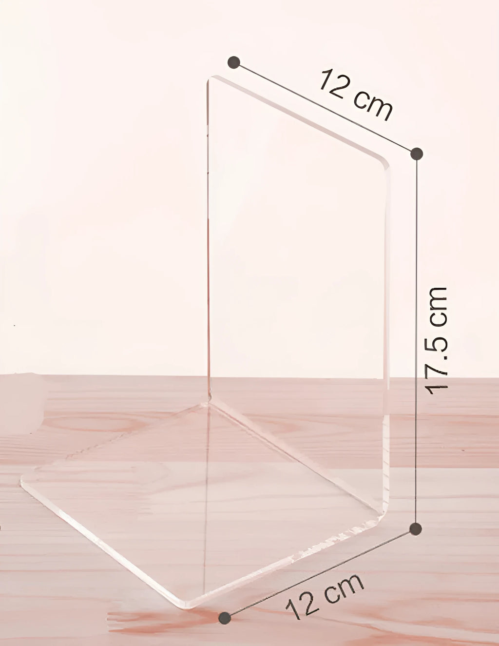 Transparent acrylic bookshelf displaying books on desk with smooth polished edges