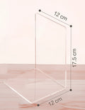 Transparent acrylic bookshelf displaying books on desk with smooth polished edges
