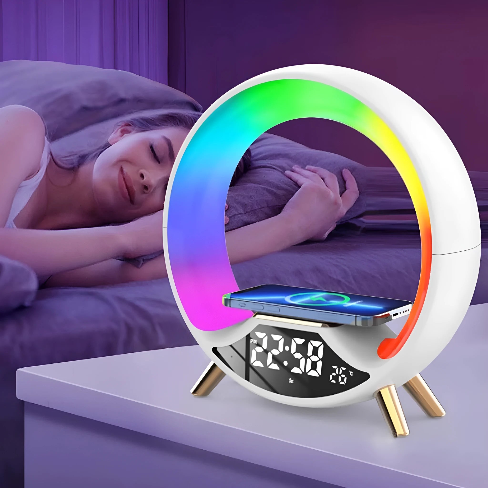 O Light three-in-one wireless charging Bluetooth speaker and night light on a bedside table.
