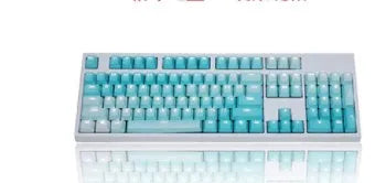 104 key set of PBT word penetration dyed keycaps in rainbow gradient style with translucent legends