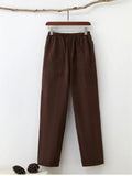 Men's beige pure cotton casual trousers with a drawstring waist on a mid-rise fit.