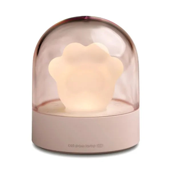 Grey cat paw USB charging music box night light with adjustable brightness on wooden desk