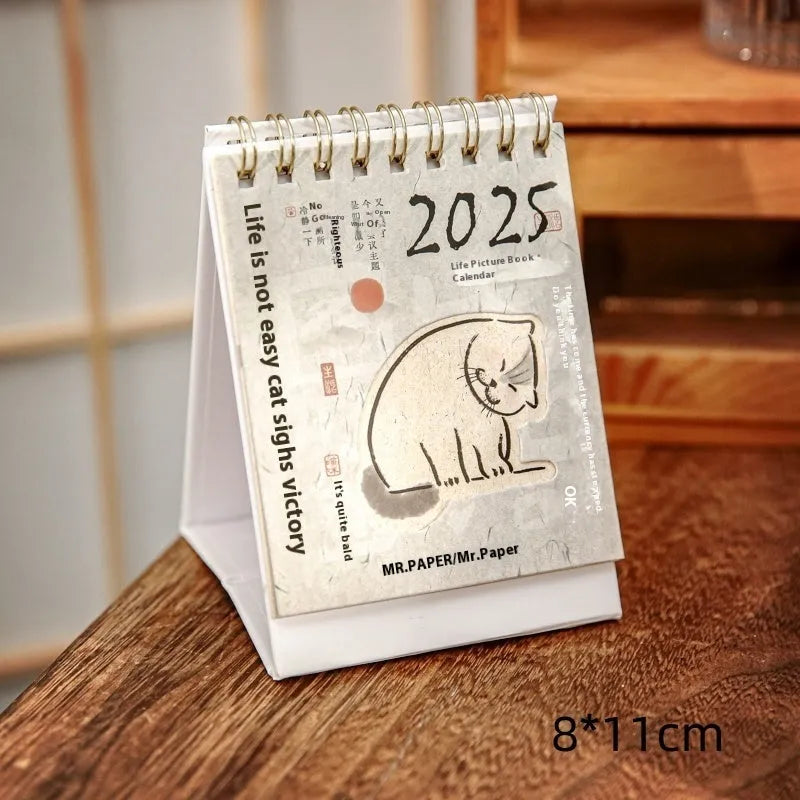 2025 mini desk calendar set showing four different paper calendar designs including Coffee Time theme