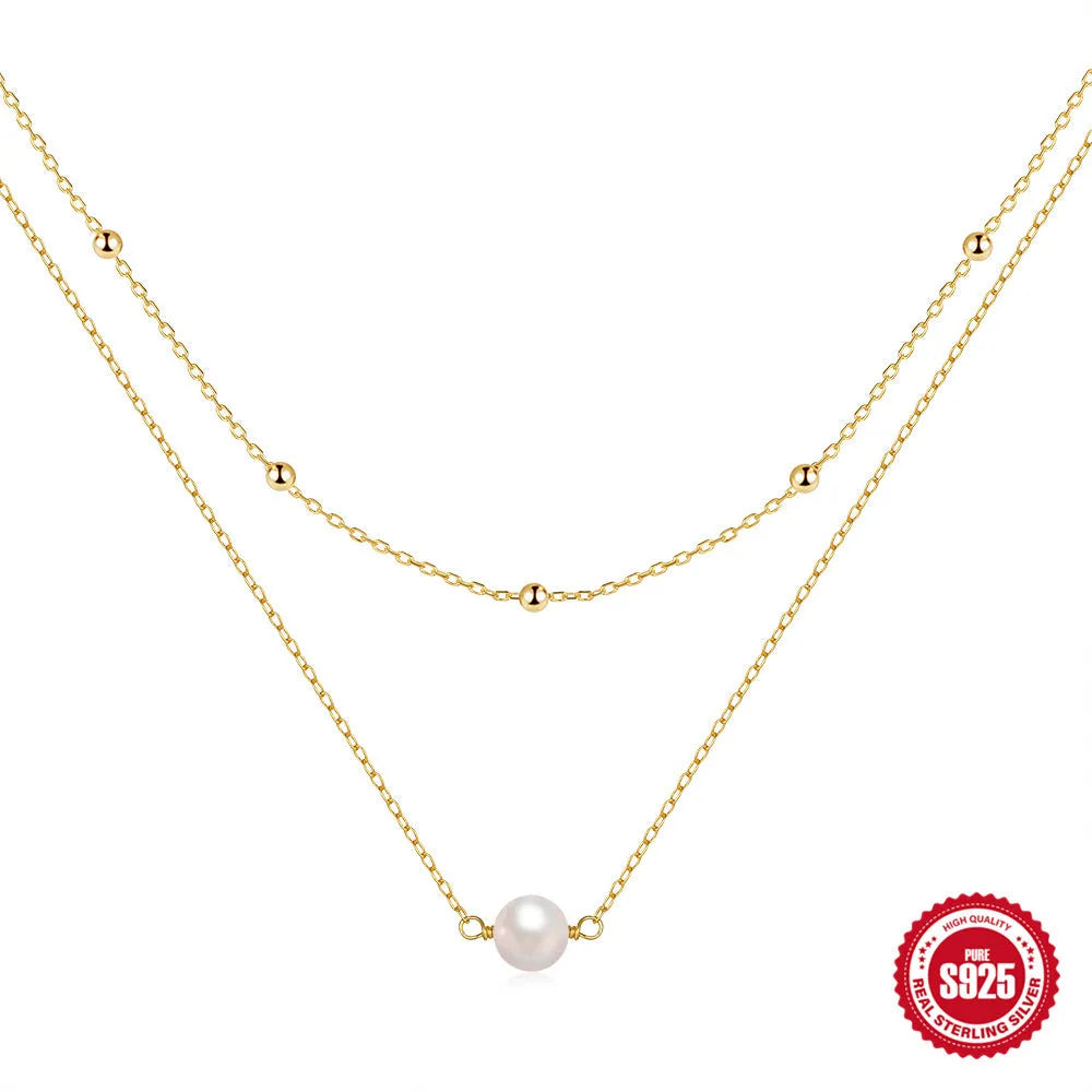 Women's sterling silver double layer twin pearl necklace with a ball bead chain in gold colour.
