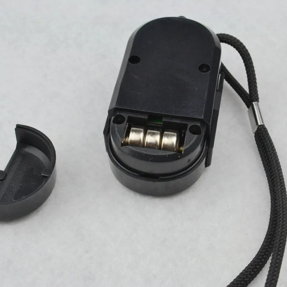SAFETY ANGEL IN06C personal infrared alarm on flat surface for wireless window and door detection