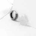 Geometric round stainless steel earrings with retro striped pattern in silver colour