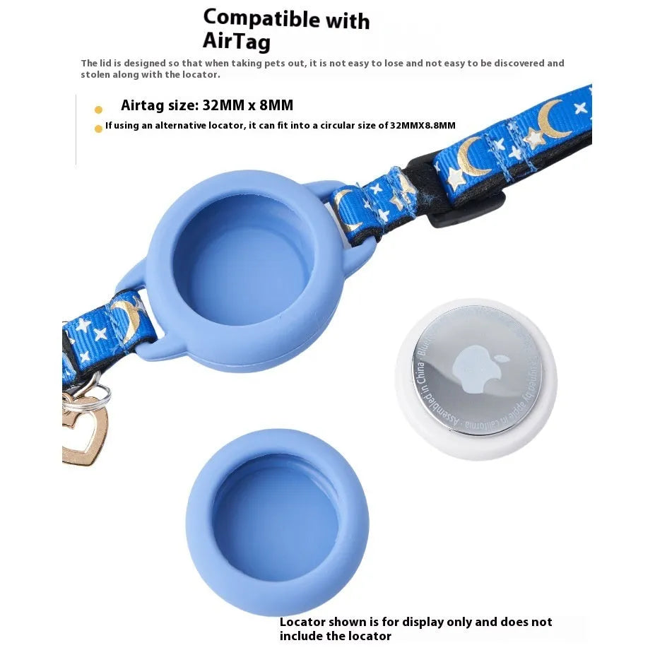 Pink plastic AirTag case attached to an adjustable breakaway cat collar on a table.