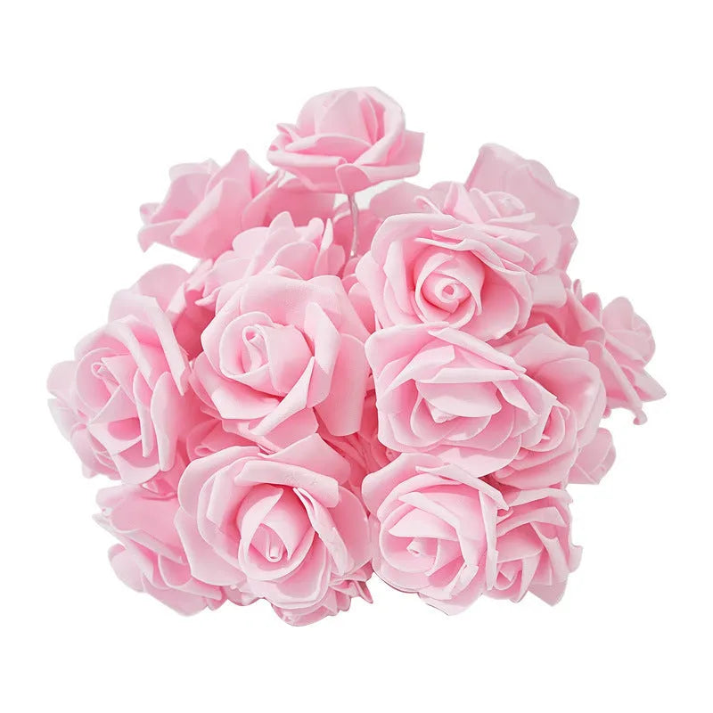 LED rose shaped coloured lights on 1.5m cable with battery power unit for indoor holiday decoration