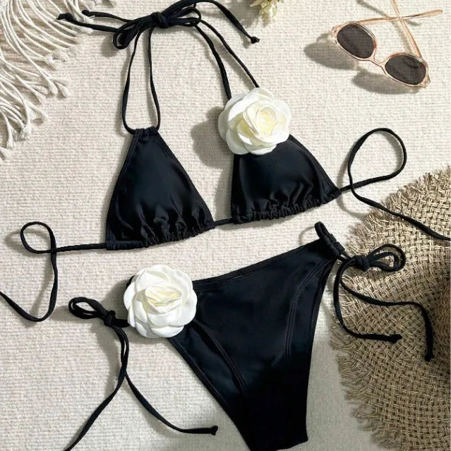 Black women's bikini set with 3D flower patterns, drawstring waist, and backless briefs design