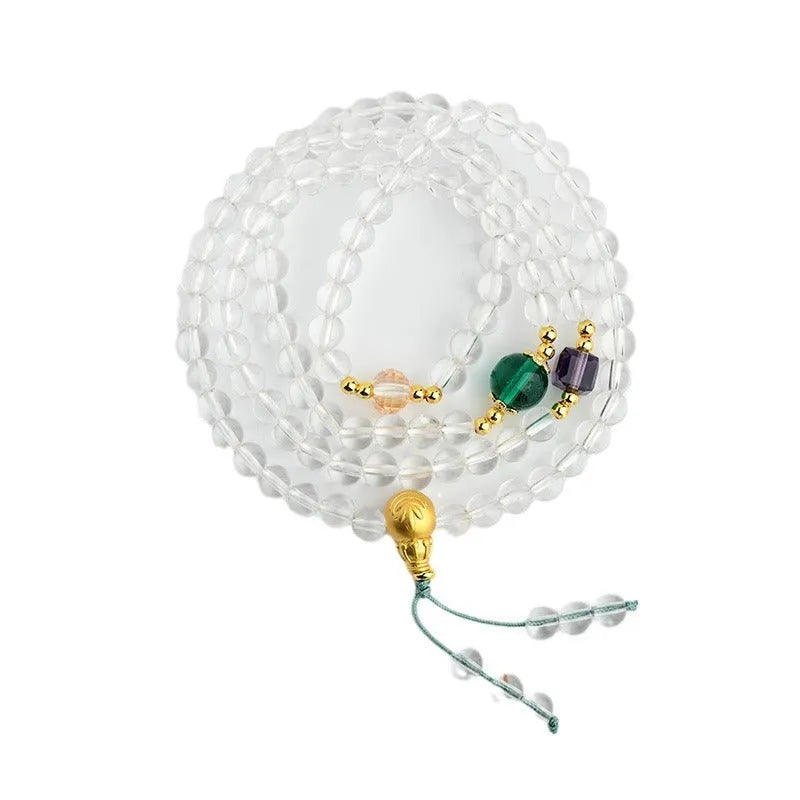 White crystal 108 bead geometric ethnic style bracelet necklace shown worn as both bracelet and necklace