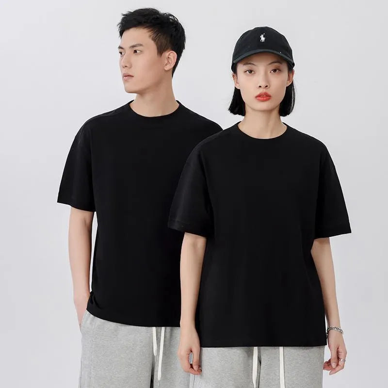 Short-sleeved loose-fit cotton pique T-shirt for youth in solid colour options