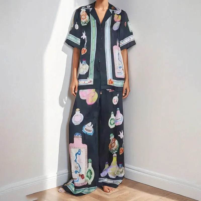Black women's cardigan and trouser set with cartoon animation print