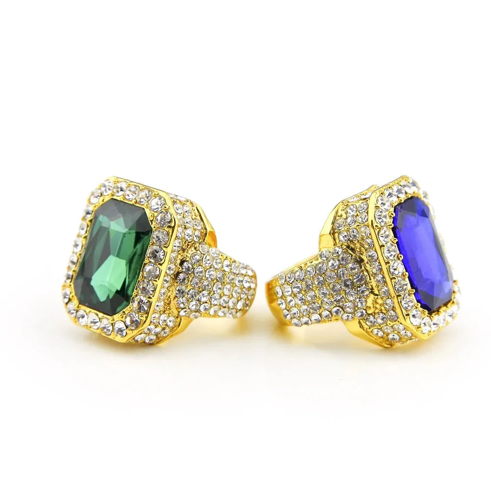 Gold-plated men's hip hop ring with emerald colour, geometric asymmetric design, and diamond treatment
