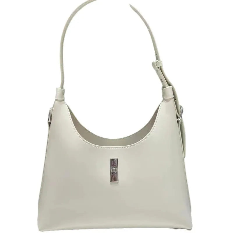 Genuine cowhide leather crossbody shoulder bag in dumpling shape with organised internal compartments