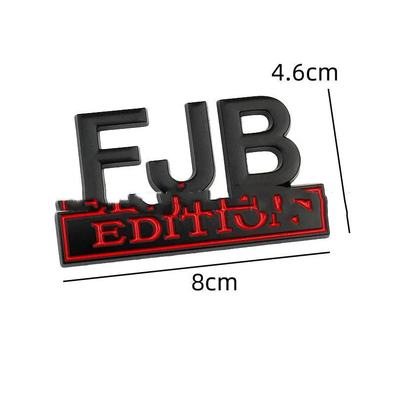 FJB EDITION zinc alloy car badge in black-red colourway for GM vehicles measuring 8x5cm