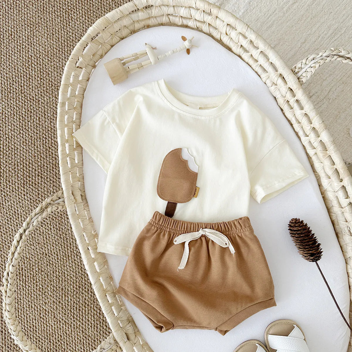 Girls' olive green cotton shorts suit set with ice cream patch detail on short sleeve shirt.