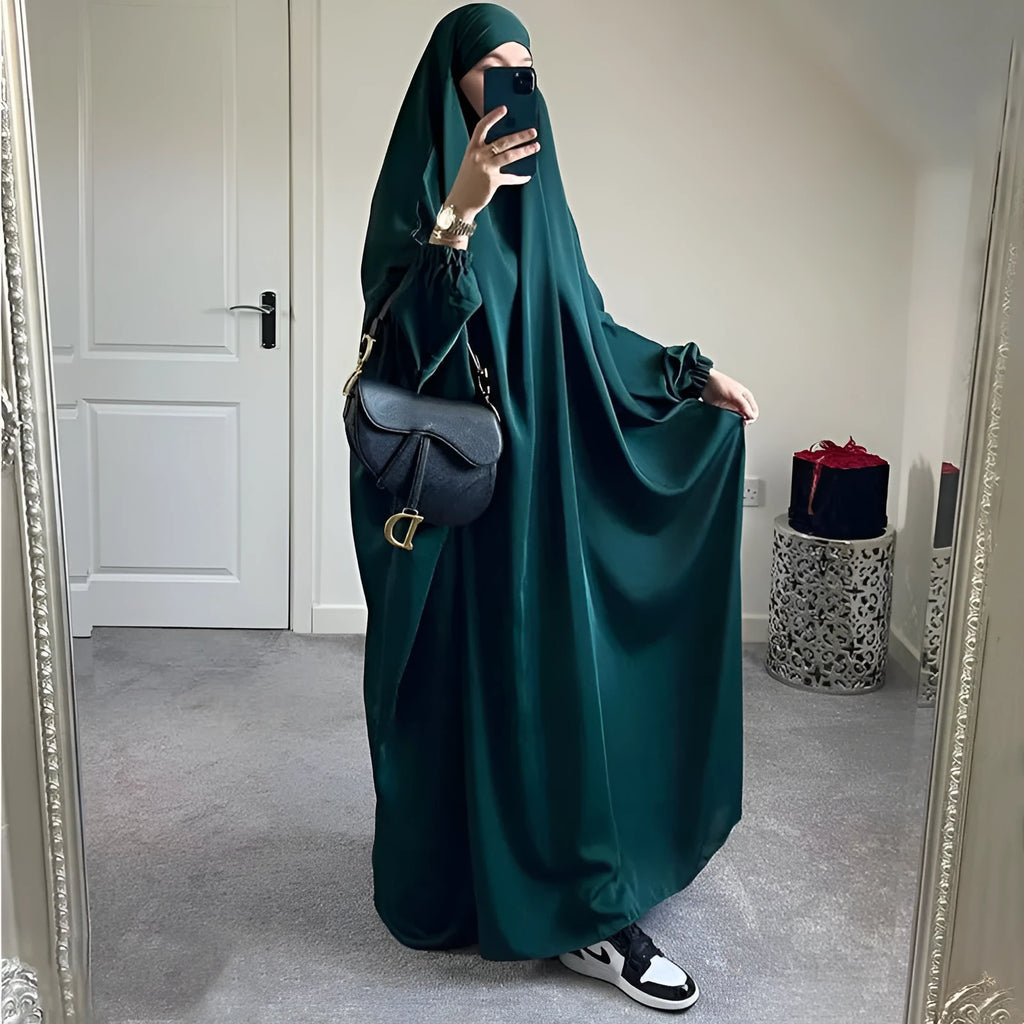 Women's one-piece prayer dress in dark green polyester with regular sleeves and strap details