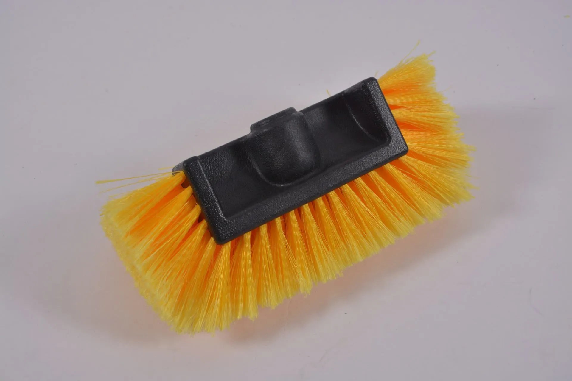 Yellow portable car wash brush with removable flow-through head and four-section adjustable rod