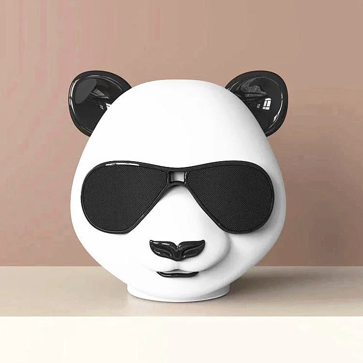 Classic style portable mini Bluetooth speaker showing USB charging port.