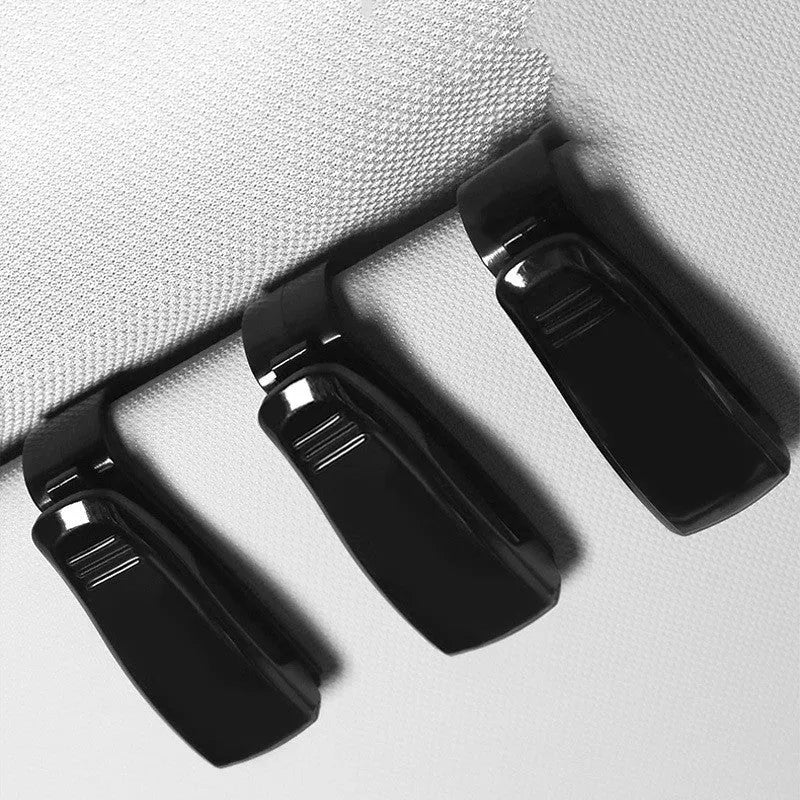 Black plastic car sun visor clip for glasses and cards measuring 6.5cm long