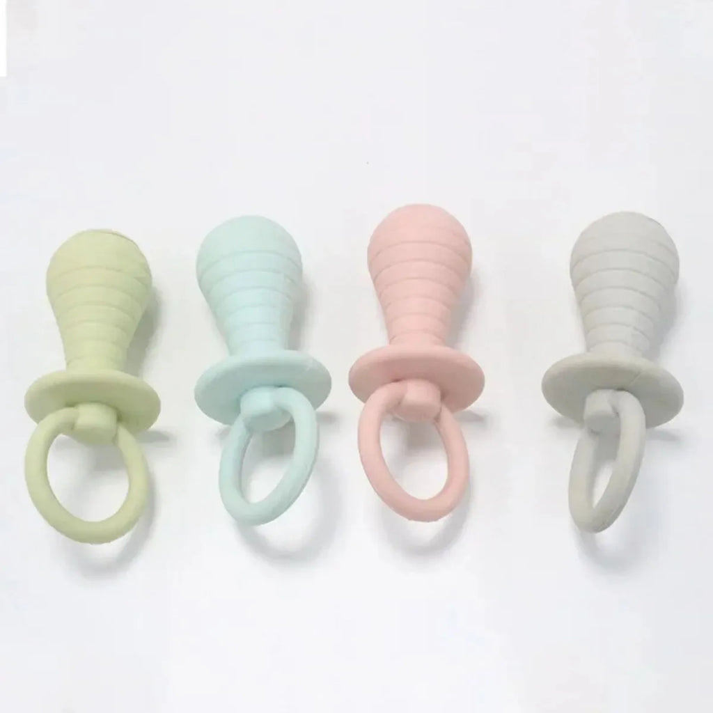 Soft TPR pacifier chew toy for puppies and kittens in blue, with internal squeaker.