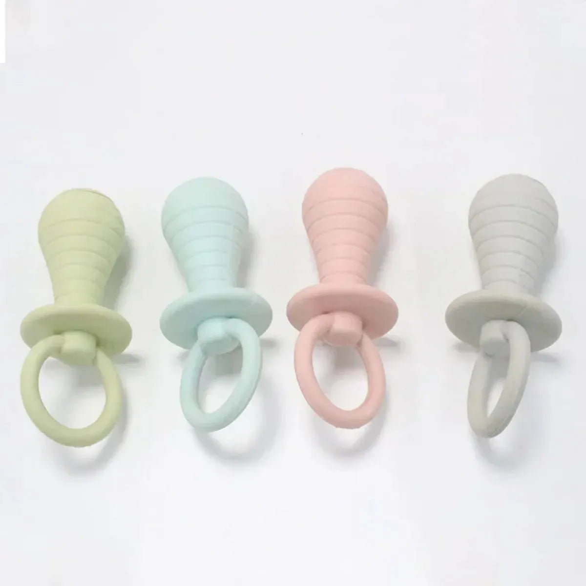 Soft TPR pacifier chew toy for puppies and kittens in blue, with internal squeaker.