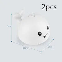 Automatic water spray whale bath toy with LED lights for baby sensory play