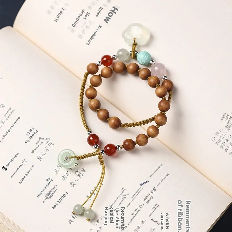Hand-woven ebony women's bracelet with double ring adjustable closure and ruyi decoration