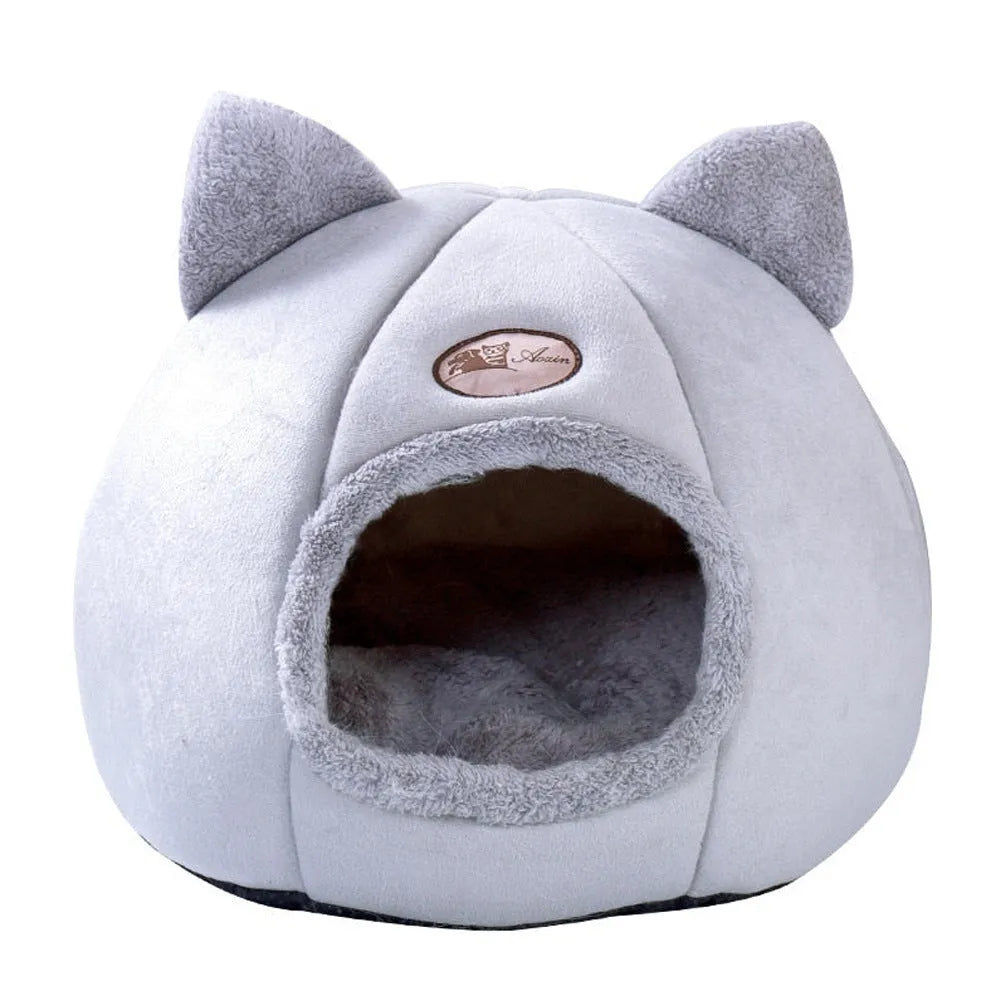 Large grey enclosed sofa-style winter nest cat bed for indoor cats, showing removable fleece lining.