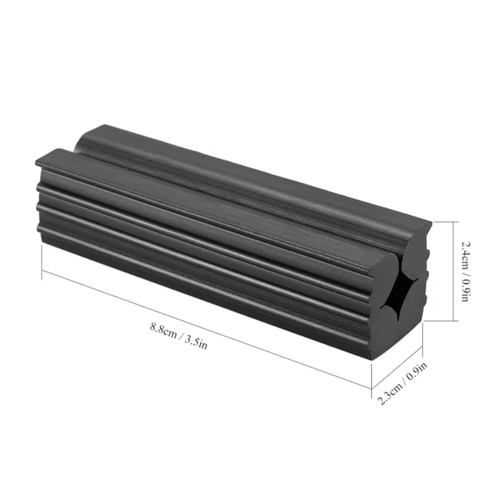 Black golf fixture rubber block grip replacement accessory on a flat surface